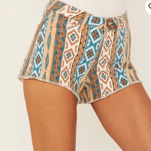 - SHYANNE WOMEN'S MR. FRAY SOUTHWESTERN PRINT FRAYED HEM SHORTS